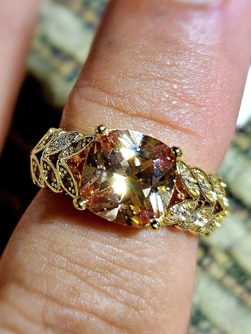 Gold-Tone Champagne Solitaire Ring with Leaf Accent